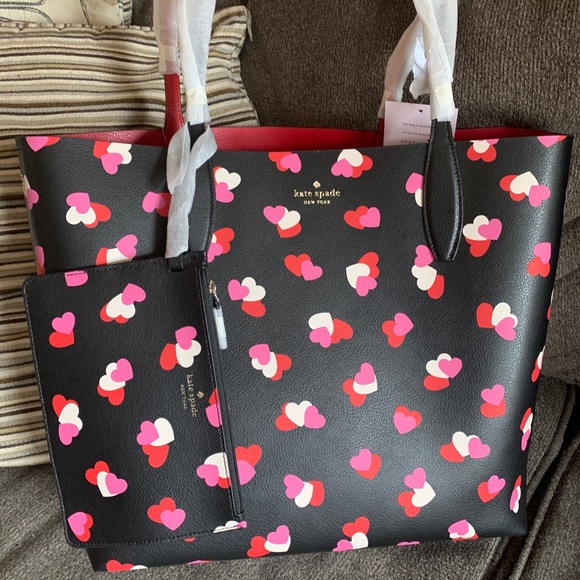 kate spade Handbags - Authentic Kate spade Colorblock leather Hearts prints large Tote/Wristlet